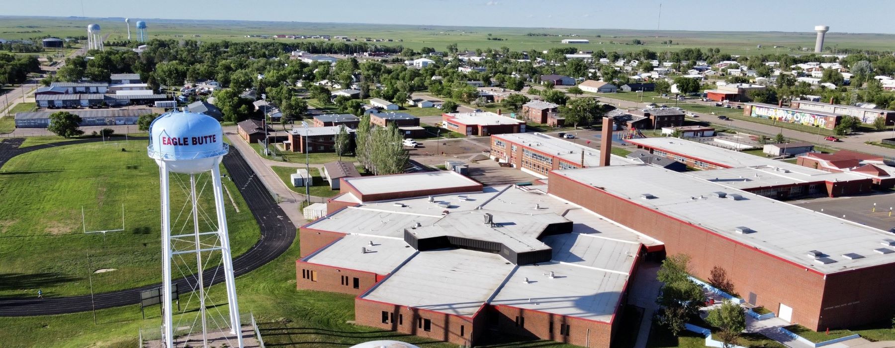 Aerial view of the water tower and school campus.